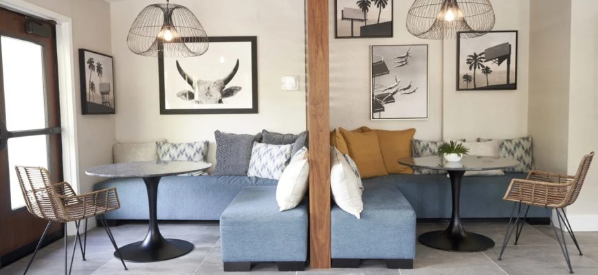 rustic sitting area with trendy art pieces in the back